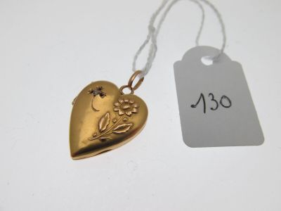une image représentant un cadenas doré en forme de cœur avec une étiquette de prix
