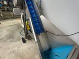 an image of a conveyor belt in a factory with a conveyor belt attached to it