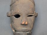 an image of a mask on a gray surface