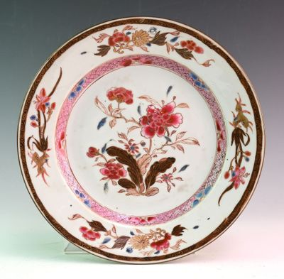 a white plate with a floral design on it