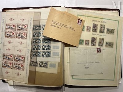 an open book with a lot of stamps on it sitting on top of a table