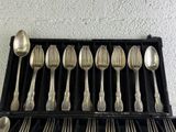 a lot of silver spoons and spoon spoons in a box