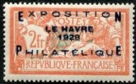 an orange and black stamp with a picture of a horse on it