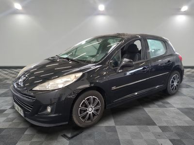 a picture of a black car parked in a garage
