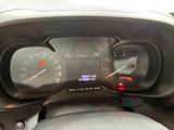 a close up of a car dashboard with a speedometer and gauges