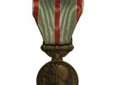 une image d'une médaille entourée d'un ruban sur fond blanc