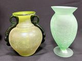 three vases sitting next to each other on a table