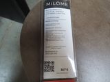 a box of milk sitting on a table with a qr code on it