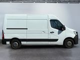 a picture of a white van parked in a garage