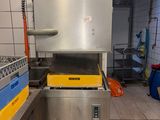 a kitchen with a sink, stove, and other items in it