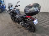a motorcycle that is parked in a garage