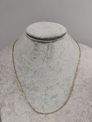 a gold chain necklace on a mannequin mannequin mannequin mannequin mannequin mannequin mannequin mannequin manne