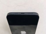 an apple iphone sitting on top of a table next to a white wall
