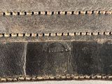 the inside of a leather wallet with stitching and stitching