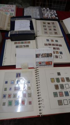 many different types of stamps on a table