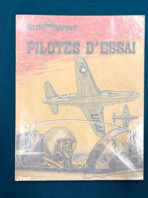 une photo d'un livre sur lequel figure l'image d'un avion