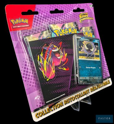 un gros plan d'une boîte de cartes Pokémon sur fond noir