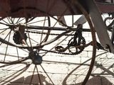 a close up view of a bike with a chain attached to it