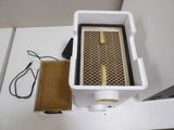 a picture of a box with a heater on top of it