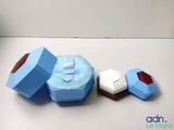 a cupcake with marshmallows and a box of marshmallows on a table