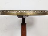 an image of a table with a metal top and wooden legs
