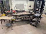 a workbench with a lot of tools on it