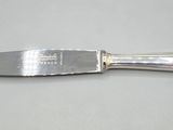 a knife that is sitting on a table