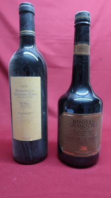 two bottles of wine sitting next to each other on a red cloth
