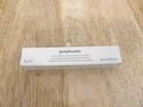 a picture of a box of soap on a wooden table