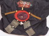 a black bag with a red and black design on it