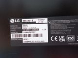 a label on the back of a laptop that says lg