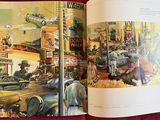an open book with a picture of a street scene in it