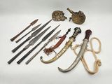 many different types of knives on a white surface
