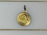 a close up of a gold coin on a gold chain