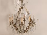 an image of a chandelier hanging from a ceiling in a room