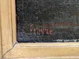 a close up of a painting on a window sill