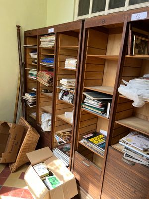 a room with a lot of boxes and boxes on the floor