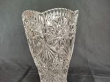 a glass vase that is sitting on a table