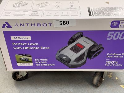 a box with a picture of a lawn mower in it