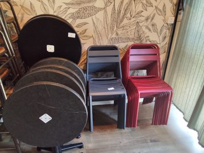 several chairs and a table in a room