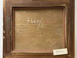an old picture of a wooden frame with writing on it