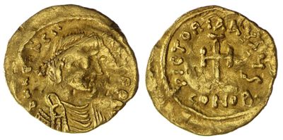 une pièce d'or portant l'image d'un homme