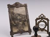 a picture of a man and a woman sitting in front of a picture frame