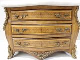 a marble top chest of drawers on a white background