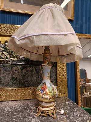 a lamp that is sitting on a table in a room