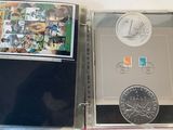 a picture of a book with a coin inside of it