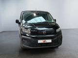 a picture of a black car parked in a room