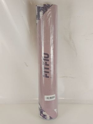 purple yoga mat with black and white design on it