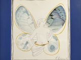 painting of a butterfly with blue wings in a blue frame