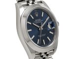 a close up of a watch with a blue dial on a bracelet